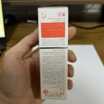 پشت جعبه کرم ضد آفتاب ضد چروک پرودرما SPF 90 شامل ترکیبات، رتینول و کوآنزیم Q10